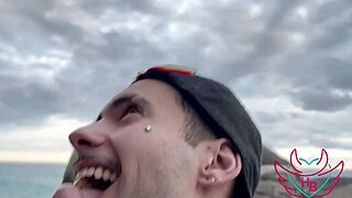 Pretty gay gets monster cock in public beach handjob
