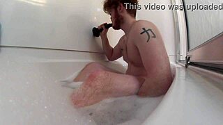 Redhead enjoys gay bath time fun