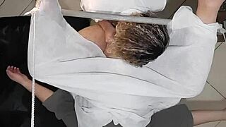 Urologist gets carried away during prostate exam, straps on for action