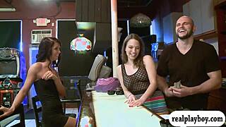 Pretty women in a threesome have oral sex for money